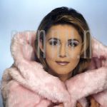 Julia Samuels at studio in Amsterdam.

[keywords]Posed, Headshot, Eyecontact, Smiling, Fur coat[/keywords]